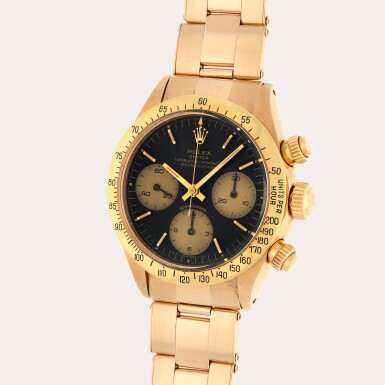 View full screen - View 1 of Lot 113. Daytona, Reference 6265 | A 14k yellow gold chronograph wristwatch with bracelet | Circa 1978.