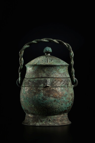 View full screen - View 1 of Lot 248. An archaic bronze ritual wine vessel (You), Late Shang dynasty | 商末 青銅卣.