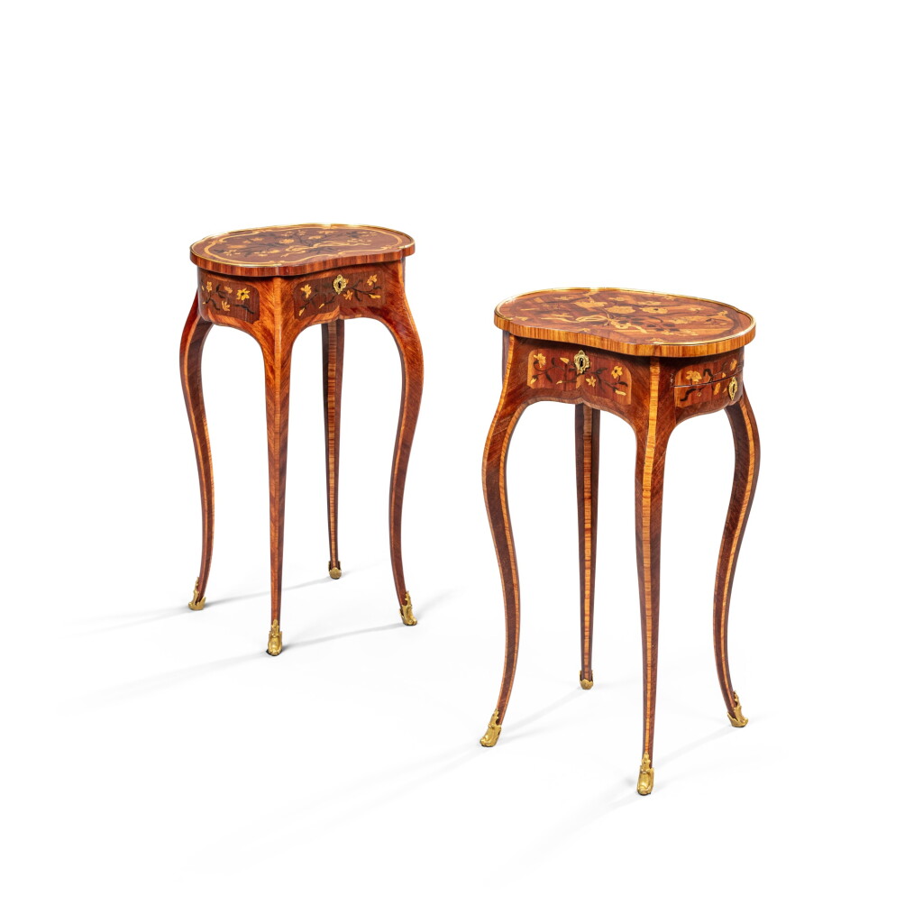 View full screen - View 1 of Lot 22. A near pair of Louis XV gilt-bronze mounted satinwood, amaranth, tulipwood, kingwood and marquetry tables, attributed to Jean-Pierre Latz, circa 1750.