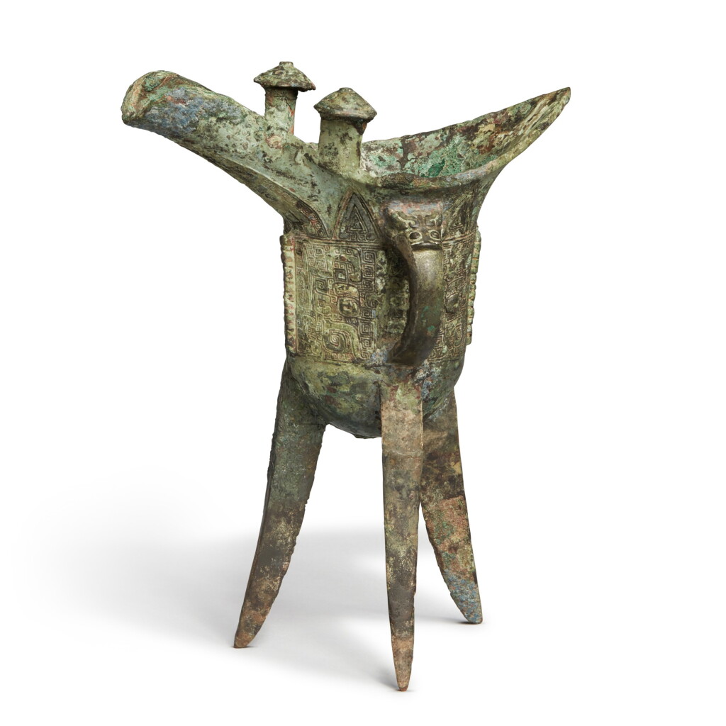 View full screen - View 1 of Lot 5. An archaic bronze ritual wine vessel (Jue), Late Shang dynasty | 商末 青銅饕餮紋爵.