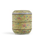 A yellow-ground painted enamel 'floral' three-tiered box and cover, Qing dynasty, 18th century | 清十八世紀 銅胎畫琺瑯花卉圖三層蓋盒