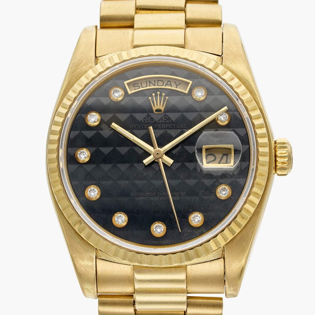 View full screen - View 1 of Lot 484. Reference 18038 Day-Date | A yellow gold automatic wristwatch with day, date, bracelet, and onyx dial, Circa 1987.