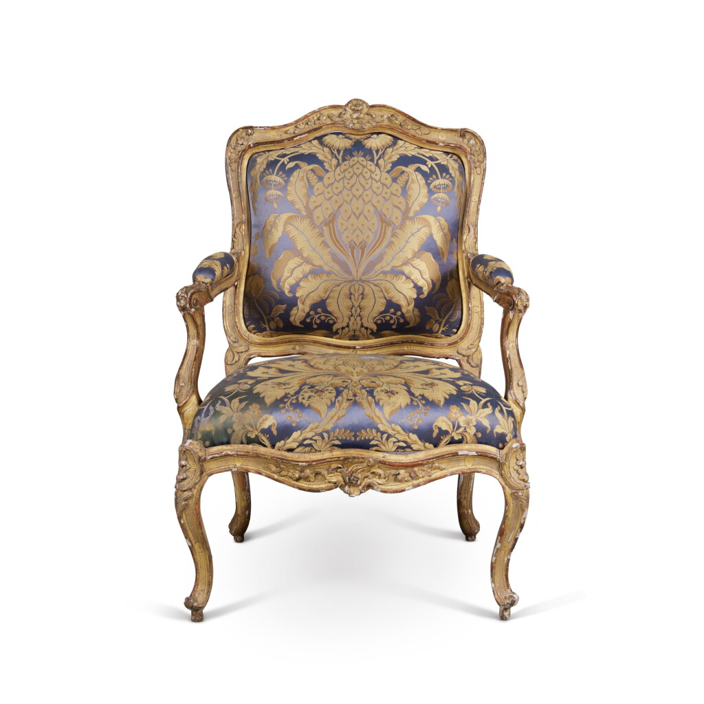 View full screen - View 1 of Lot 643. A Louis XV Carved and Giltwood Fauteuil à la Reine et à Châssis, Circa 1755.