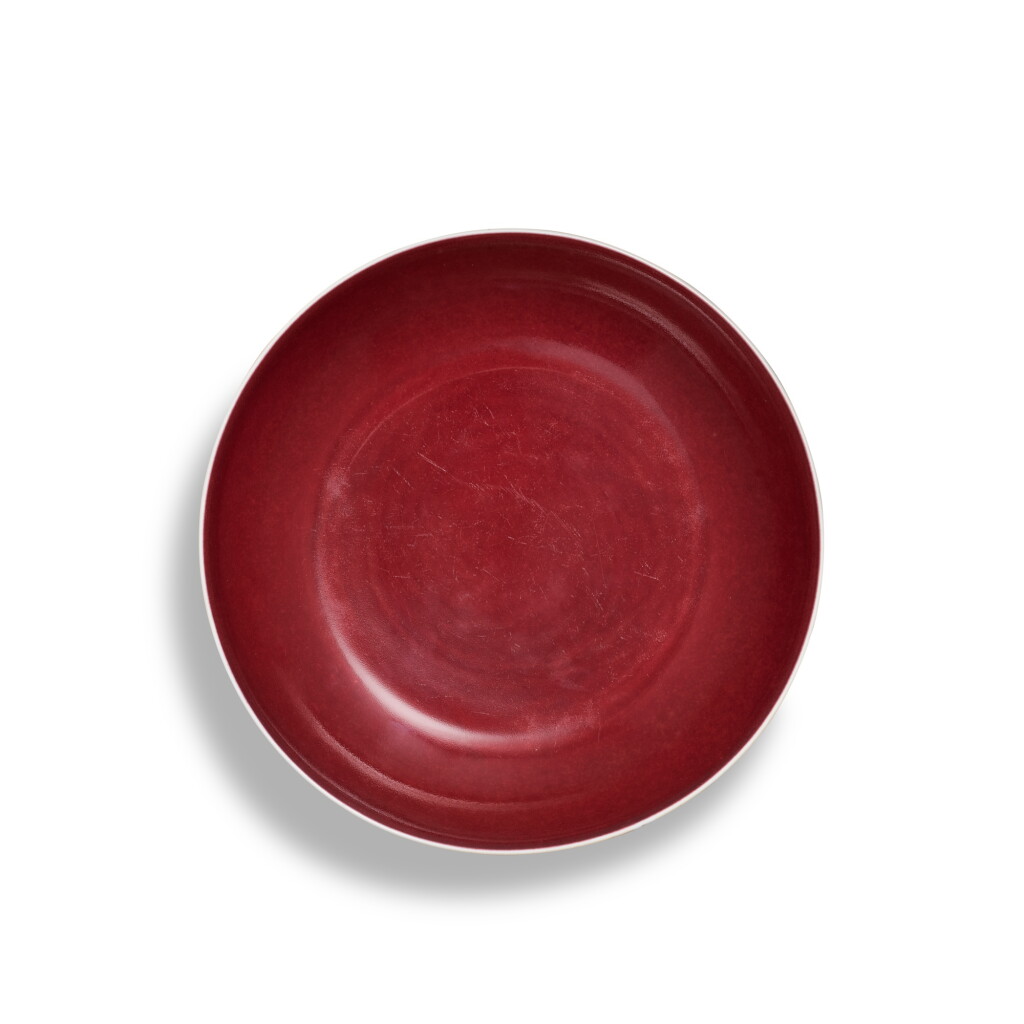View full screen - View 1 of Lot 5875. A red-glazed dish, Seal mark and period of Qianlong | 清乾隆 紅釉盤 《大清乾隆年製》款.