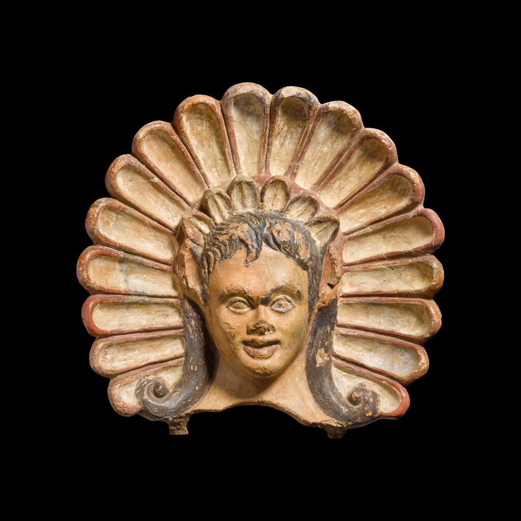 View full screen - View 1 of Lot 412. An Etruscan Polychrome Terracotta Antefix, circa 5th Century B.C..
