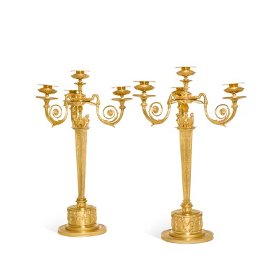 View full screen - View 1 of Lot 70. A pair of gilt-bronze four-light candelabra, probably Northern European, early 19th century.