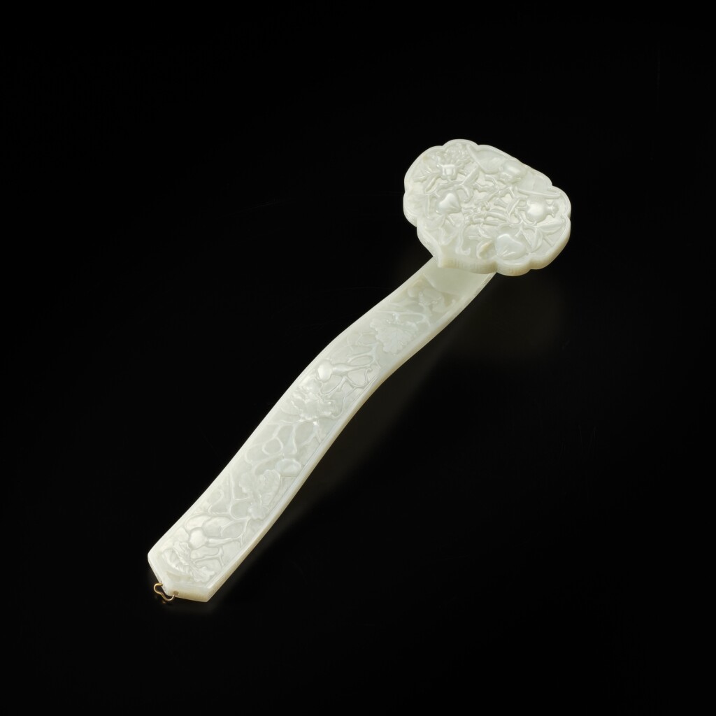 A carved white jade 'bats and fruit' ruyi scepter, Qing dynasty, 19th ...