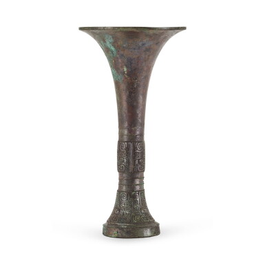 View full screen - View 1 of Lot 5050. An inscribed archaic bronze ritual wine vessel, gu, Late Shang dynasty 商晚期 青銅饕餮紋觚.