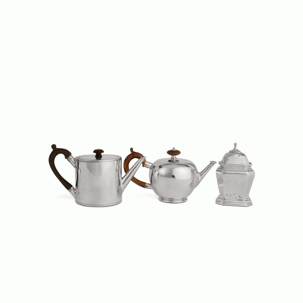 View full screen - View 1 of Lot 16. A Georgian Silver Tea Caddy and Two Teapots, London, 1713-94.