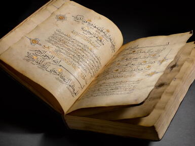 View full screen - View 1 of Lot 525. A large illuminated volume from a four-volume Qur'an, Persia, Ilkhanid, early 14th century.