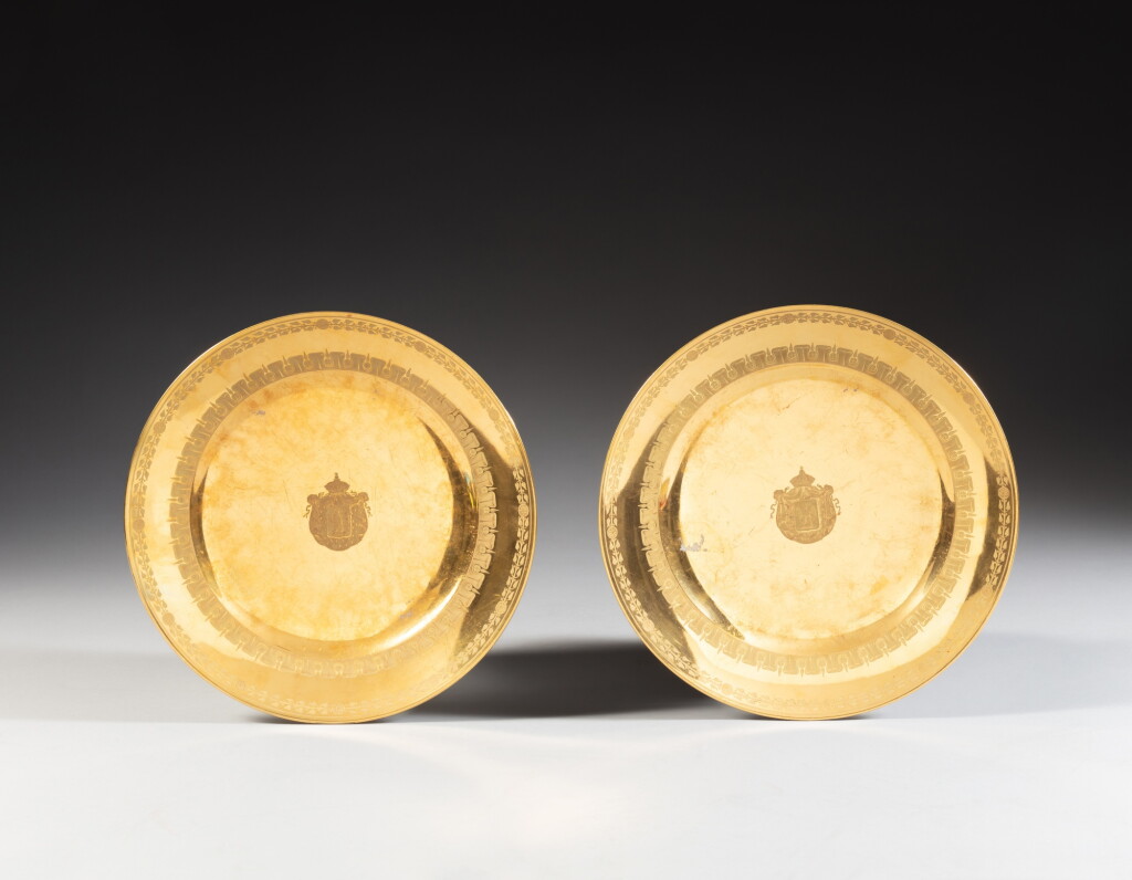 View full screen - View 1 of Lot 63. A pair of Paris (Dihl et Guérhard) porcelain burnished gold-ground armorial plates from the service made for Joséphine de Beauharnais, circa 1811-1813.