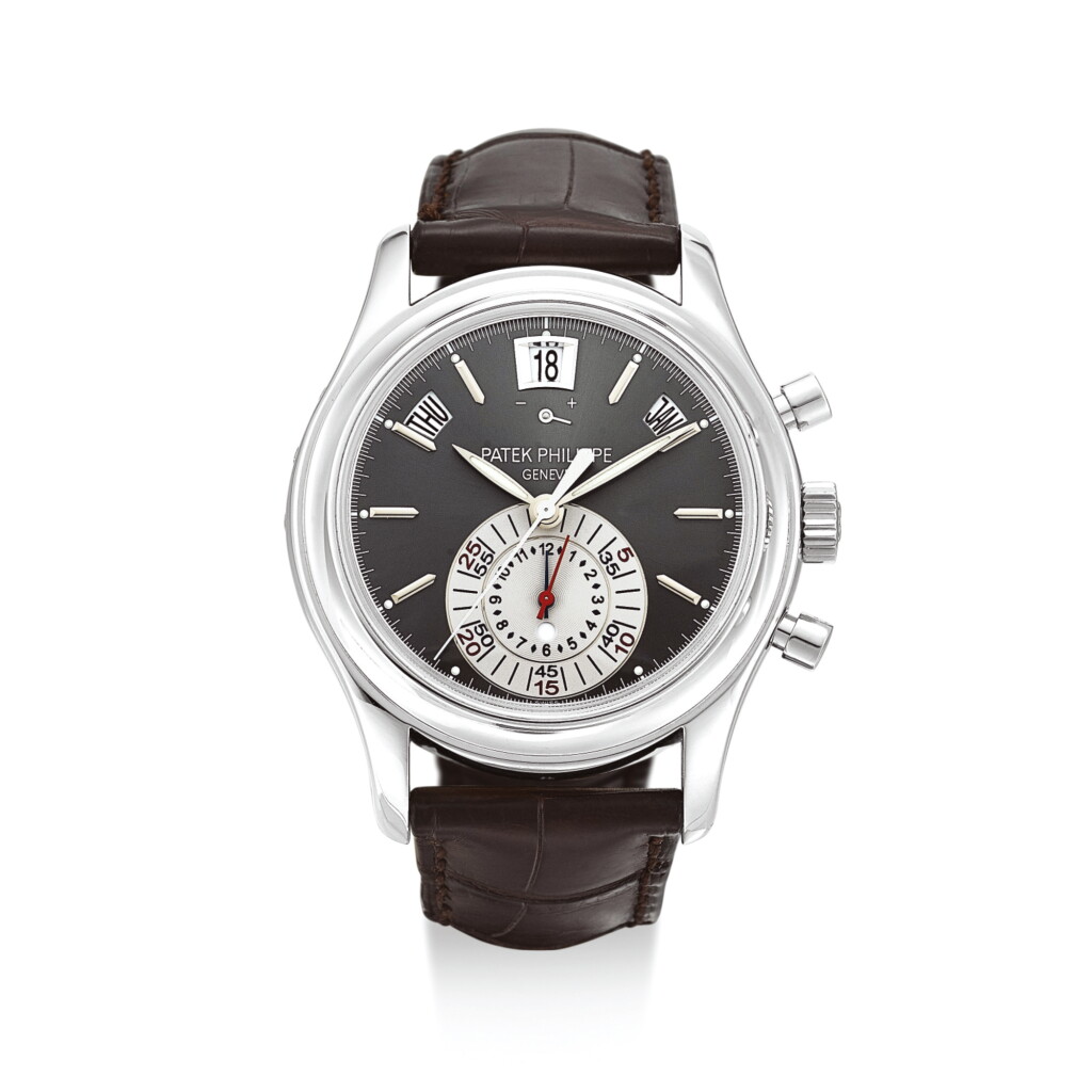 View full screen - View 1 of Lot 2050. PATEK PHILIPPE | REFERENCE 5960 A PLATINUM ANNUAL CALENDAR FLYBACK CHRONOGRAPH WRISTWATCH WITH POWER RESERVE AND DAY AND NIGHT INDICATION, MADE IN 2007 | 百達翡麗 | "型號5960 白金年曆飛返計時腕錶,備動力儲備及晝夜顯示,機芯編號3502824,錶殼編號4440335,2007年製".