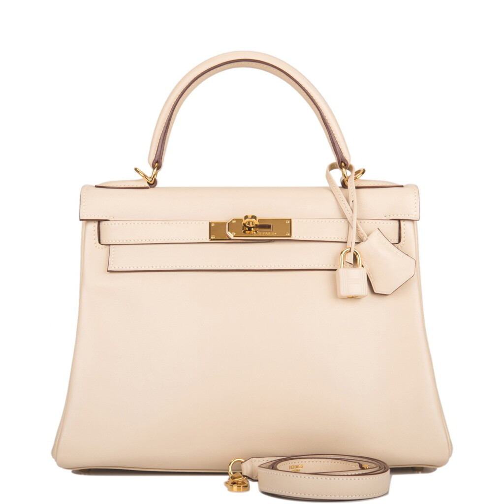 View full screen - View 1 of Lot 30. Hermès Parchemin Retourne Kelly 28cm of Swift Leather with Gold Hardware.