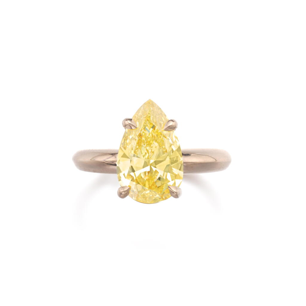 View full screen - View 1 of Lot 511. Fancy Intense Yellow diamond ring.