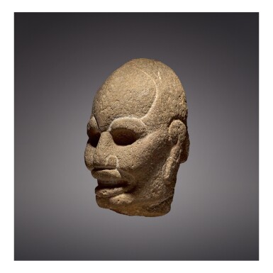 View full screen - View 1 of Lot 132. VERACRUZ STONE HEAD HACHA LATE CLASSIC, CIRCA AD 550-950.