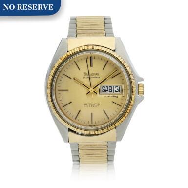 View full screen - View 1 of Lot 202. Oceanographer A stainless steel and gold plated automatic wristwatch with day, date and bracelet, Circa 1978.