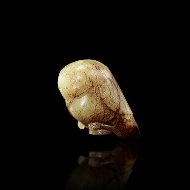 View full screen - View 1 of Lot 3020. A celadon and russet jade 'bird' finial, Song dynasty 宋 青玉瑞鳥杖首.