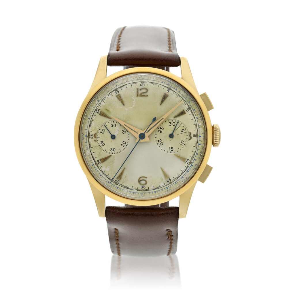 View full screen - View 1 of Lot 116. Reference 2635 A large yellow gold chronograph wristwatch, Circa 1965 .