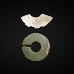A celadon jade slit ring, jue, Western Zhou dynasty and a celadon jade notched pendant, huang, Neolithic period, Taosi Culture | 西周 青玉玦 及 新石器時代陶寺文化 青玉璜形佩