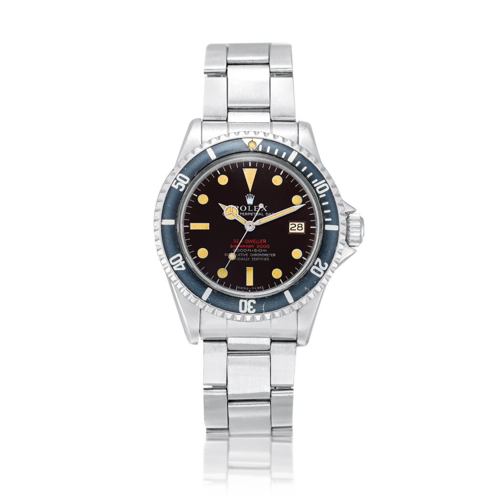 View full screen - View 1 of Lot 2256. "Double Red Patent Pending" Sea-Dweller, Reference 1665 | A stainless steel wristwatch with tropical dial, date and bracelet, Circa 1967 | 勞力士 | "Double Red Patent Pending" Sea-Dweller 型號1665 | 精鋼鏈帶腕錶,備棕式錶盤及日期顯示,約1967年製.