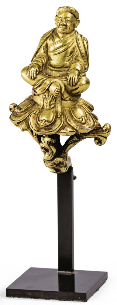 View full screen - View 1 of Lot 24. STATUETTE DE MARPA EN ALLIAGE DE CUIVRE DORÉ TIBET, XVIIIE SIÈCLE | 西藏 十八世紀 鎏金銅合金馬爾巴坐像 | A rare small gilt-copper alloy figure of Marpa, Tibet, 18th century.