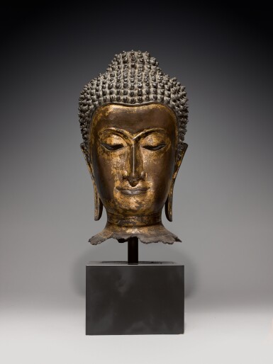 View full screen - View 1 of Lot 111. A gilt-copper alloy head of Buddha Ayutthaya style, Thailand, 20th century | 暹邏 二十世紀 阿瑜陀耶較式鎏金銅合金佛首像.