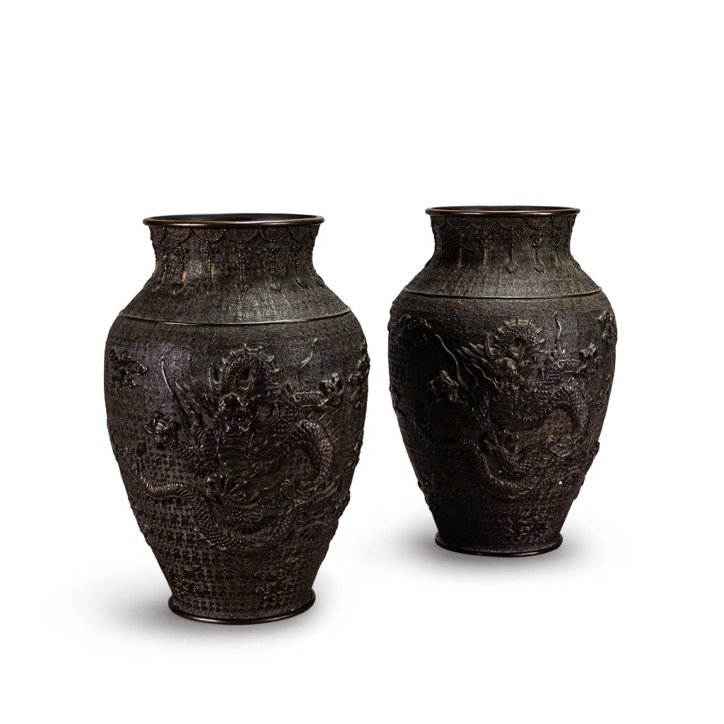 View full screen - View 1 of Lot 201. A pair of bronze 'dragon' vases, Qing dynasty | 清 銅鑄雲龍紋瓶一對.