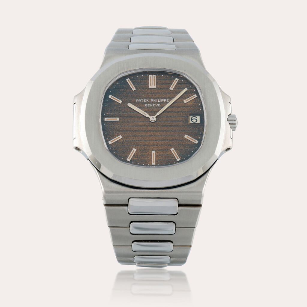 View full screen - View 1 of Lot 164. Nautilus 'Jumbo', Reference 3700/1A | A stainless steel wristwatch with date, bracelet, tropical dial and cork presentation case | Circa 1978.