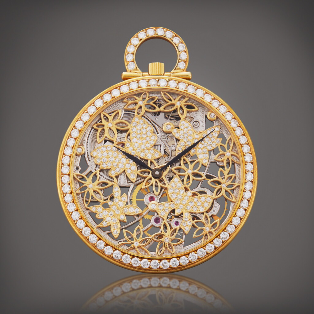 View full screen - View 1 of Lot 54. Reference 35775BA | A yellow gold and diamond-set skeletonized open faced watch, Circa 1985.