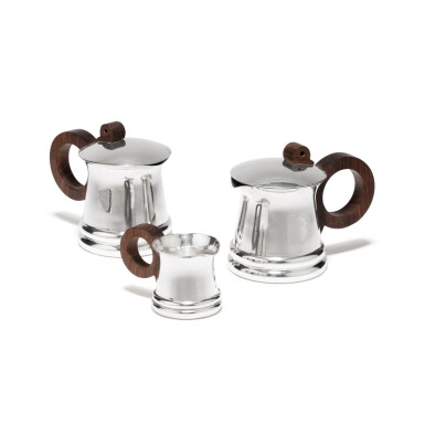 View full screen - View 1 of Lot 65. A silver and rosewood 3-piece coffee-set, Jean E. Puiforcat, Paris, circa 1935 | Service à café toi et moi de trois pièces en argent et palissandre de Rio par Jean E. Puiforcat, Paris, vers 1935.