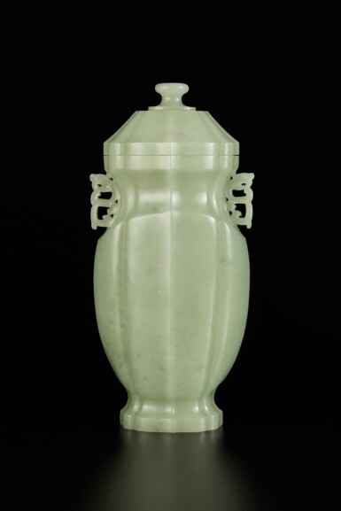 View full screen - View 1 of Lot 202. A celadon jade barbed vase and cover, Qing dynasty, Qianlong period | 清乾隆 青玉菱花式夔龍耳蓋瓶.