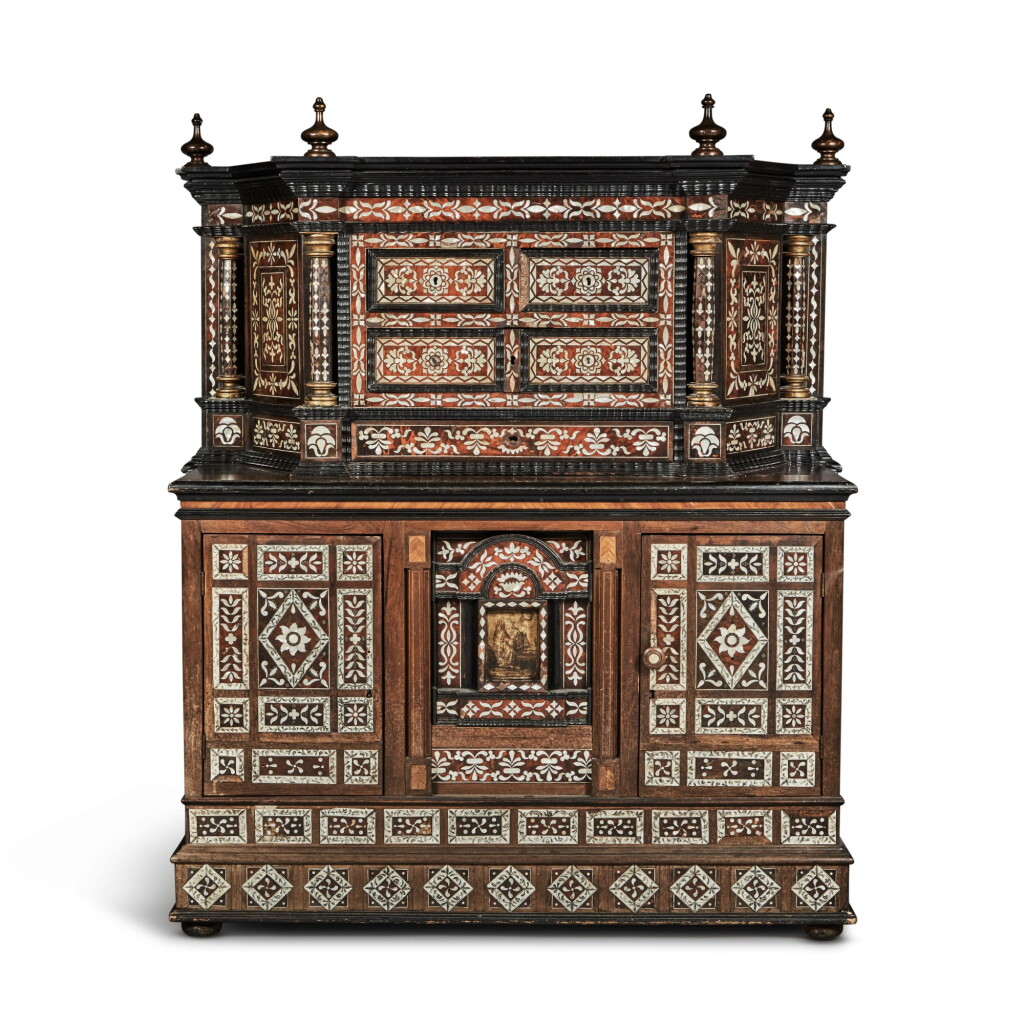 View full screen - View 1 of Lot 6. A Spanish Colonial Mueble Enconchado Inlaid with Mother-of-Pearl and Tortoiseshell Veneer, with an Oil on Copper Painting Depicting the Virgen de Guadalupe, the Upper Section Late 17th/Early 18th Century, the Lower Section later reconstructed incorporating original and associated Late 17th/Early 18th Century elements.