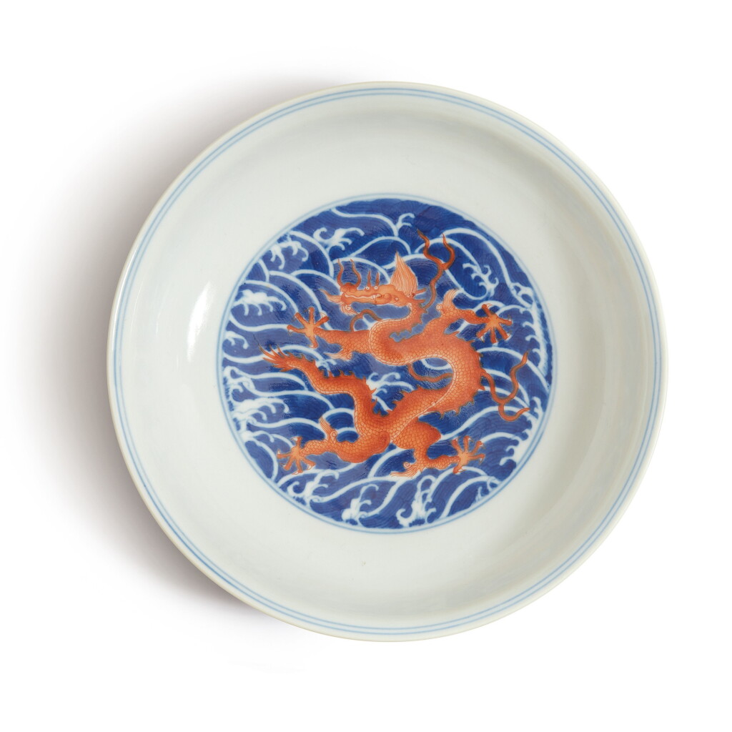 View full screen - View 1 of Lot 558. A BLUE AND WHITE AND IRON-RED 'DRAGON' DISH, QIANLONG SEAL MARK AND PERIOD.