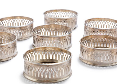 View full screen - View 1 of Lot 130. A set of twelve silver glass-coasters, Emanuele Caber, Milan, circa 1810 | Ensemble de douze sous-verres en argent par Emanuele Caber, Milan, vers 1810.