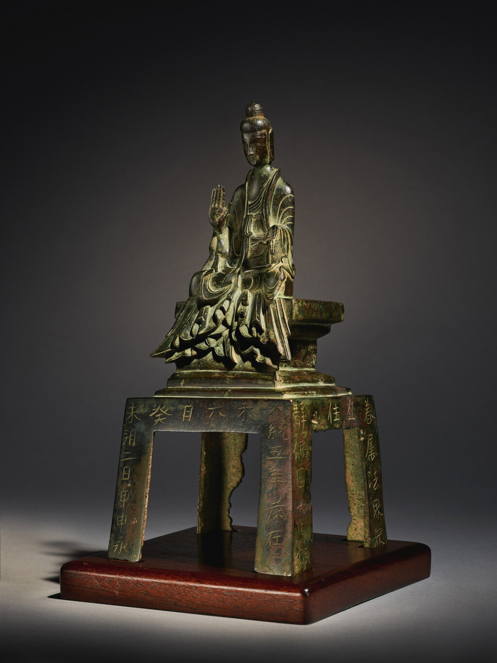 View full screen - View 1 of Lot 3503. An extremely rare large inscribed bronze figure of Shakyamuni Buddha Western Wei dynasty, dated 539 | 西魏大統五年 銅釋迦牟尼佛坐像.
