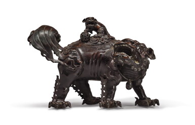View full screen - View 1 of Lot 402. A large bronze 'Buddhist lion' censer and cover, Ming dynasty, 14th / 15th century | 明十四 / 十五世紀 銅太獅少獅大熏爐.