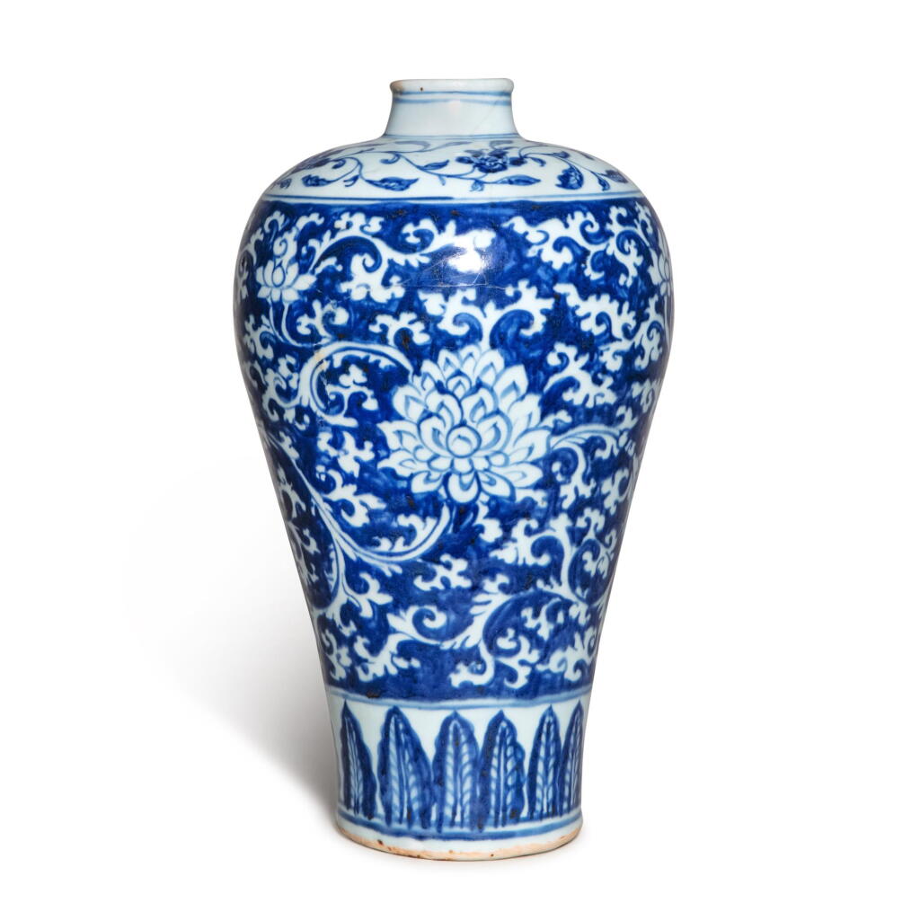 View full screen - View 1 of Lot 711. A rare blue and white 'lotus' meiping, Ming dynasty, 15th century | 明十五世紀 青花地留白纏枝蓮紋梅瓶.