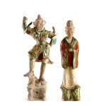 Two sancai pottery figures of an official and a Lokapala, Tang dynasty | 唐 三彩文官俑 及 天王俑一組兩件