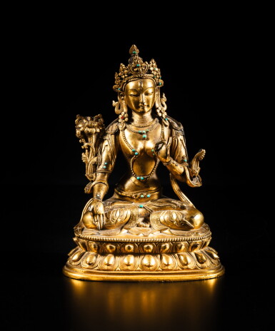 View full screen - View 1 of Lot 17. A gilt-bronze figure of White Tara, Qing dynasty, 18th century | 清十八世紀 銅鎏金白度母坐像.