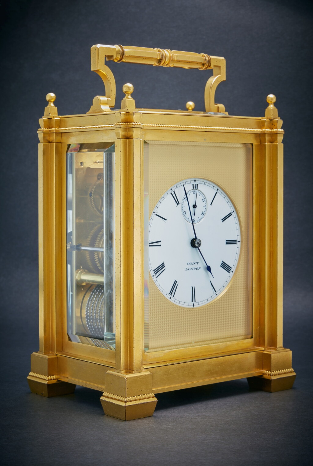 View full screen - View 1 of Lot 28. A rare and large English gilt-brass eight-day hour striking and repeating chronometer carriage clock with Dent’s patented staple balance, No. 20378, Circa 1850.