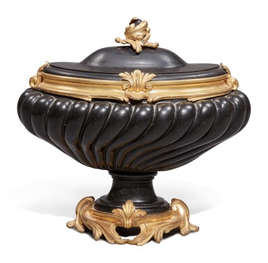 View full screen - View 1 of Lot 11. A Louis XV Gilt Bronze-Mounted Diorite Navette Vase with a Nero di Belgio Cover, Circa 1750, the Vase Possibly Roman 17th Century.