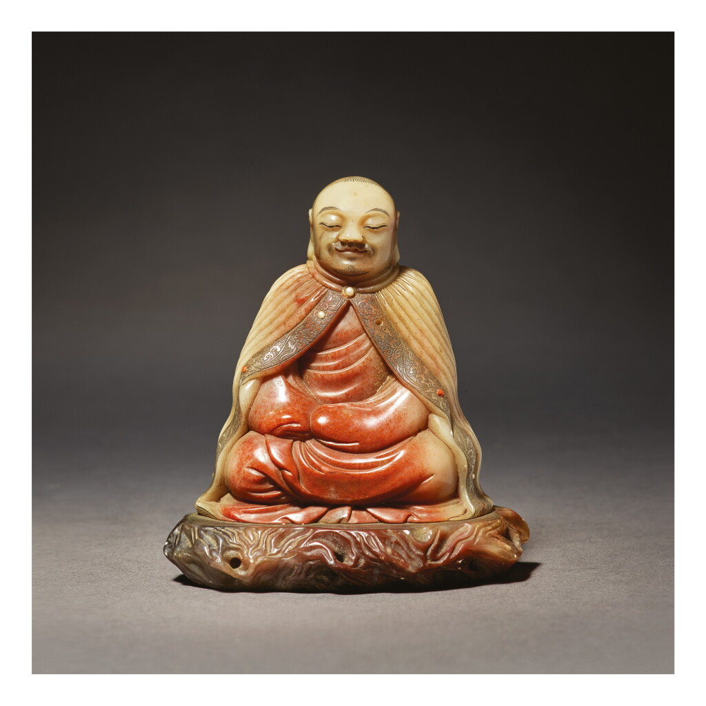 View full screen - View 1 of Lot 673. A SUPERB SOAPSTONE FIGURE OF A LUOHAN, ATTRIBUTED TO ZHOU BIN, 17TH / 18TH CENTURY.
