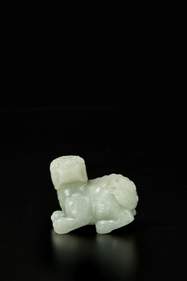 View full screen - View 1 of Lot 95. A celadon jade figure of a mythical beast, 17th / 18th century.