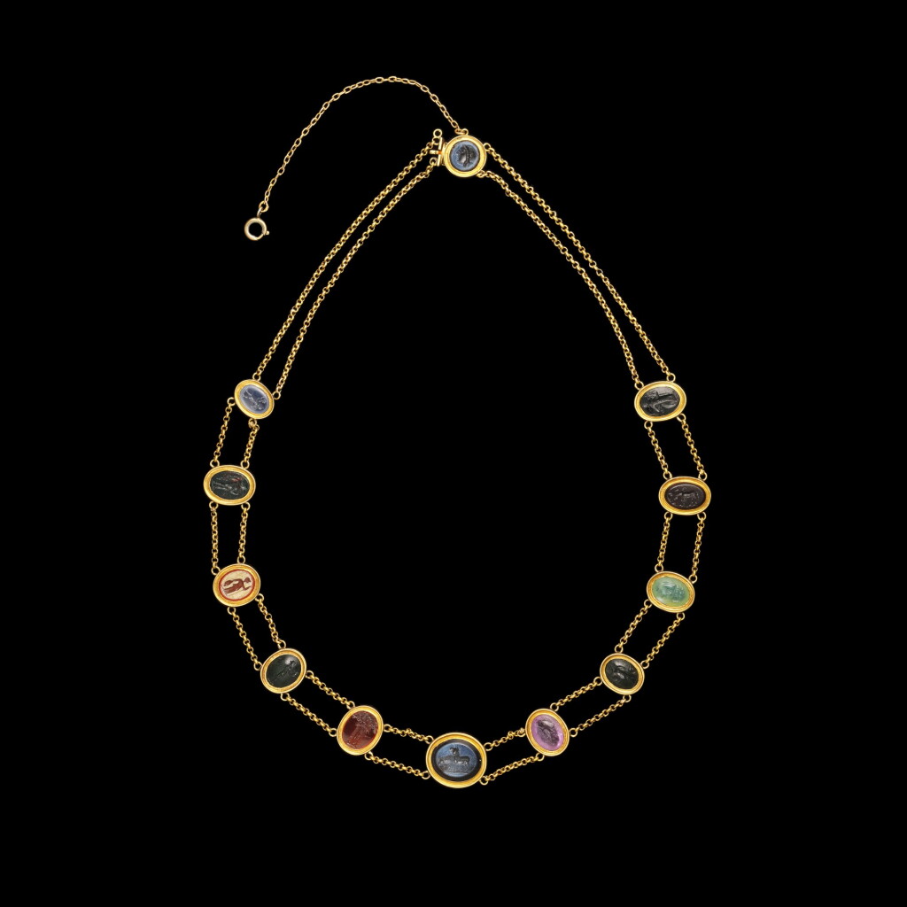 View full screen - View 1 of Lot 113. A Gold Necklace with Twelve Roman Intaglios, 1st/2nd century A.D..