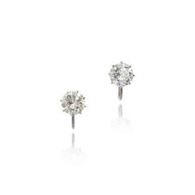 View full screen - View 1 of Lot 942. Pair of diamond earrings.