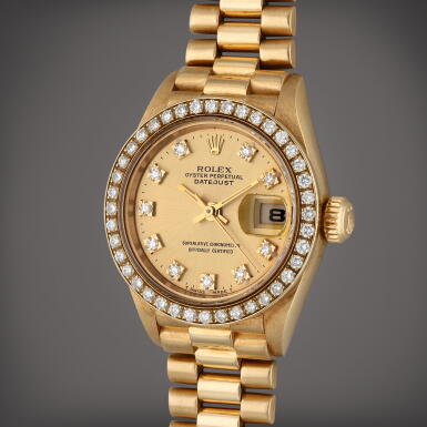 View full screen - View 1 of Lot 260. Reference 69138 Datejust | A yellow gold and diamond-set automatic wristwatch with date and bracelet, Circa 1990.