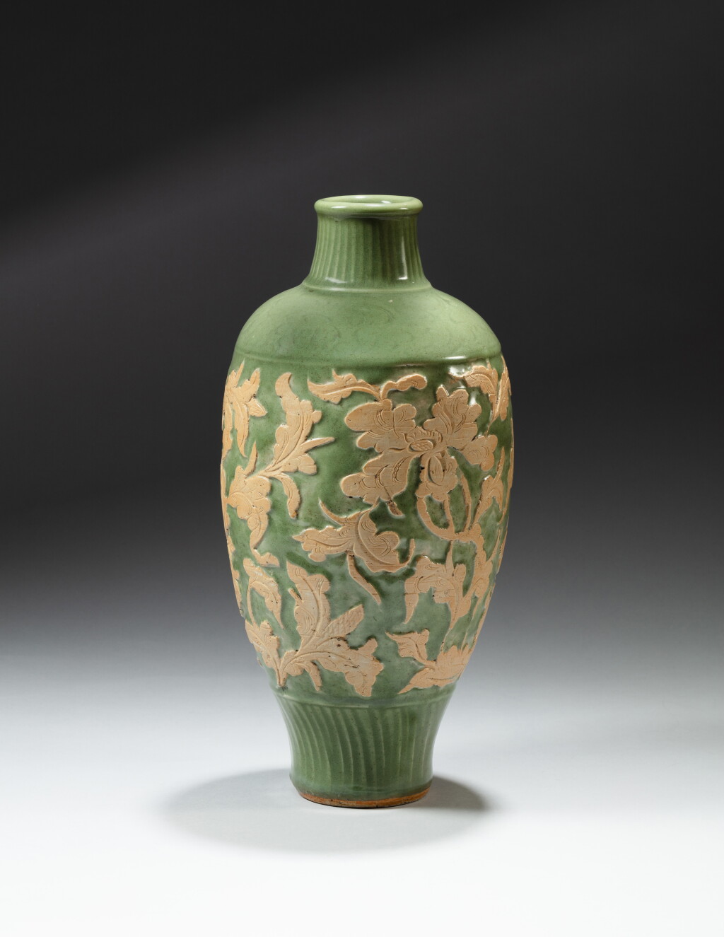 View full screen - View 1 of Lot 66. A rare 'Longquan' celadon-glazed and biscuit-decorated 'peony' vase, Ming dynasty, 15th - 16th century | 明十五至十六世紀 龍泉窰青釉牡丹紋梅瓶.