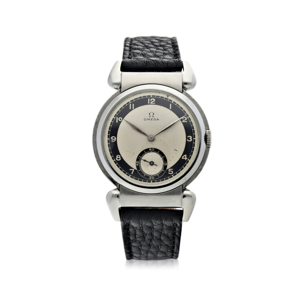 View full screen - View 1 of Lot 142. OMEGA | A STAINLESS STEEL WRISTWATCH WITH SCARAB HOODED LUGS, CIRCA 1938.