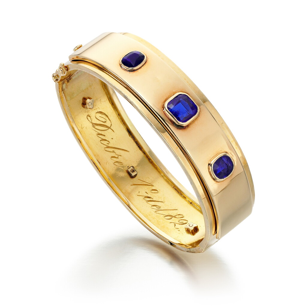 View full screen - View 1 of Lot 61. SAPPHIRE AND PASTE BANGLE .