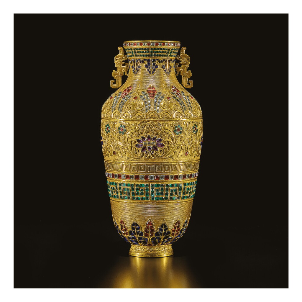 View full screen - View 1 of Lot 637. A RARE PASTE-INSET GILT-BRONZE REPOUSSE VASE, QING DYNASTY, QIANLONG PERIOD.